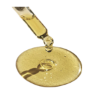 A drop of vitamin oil from a pipette